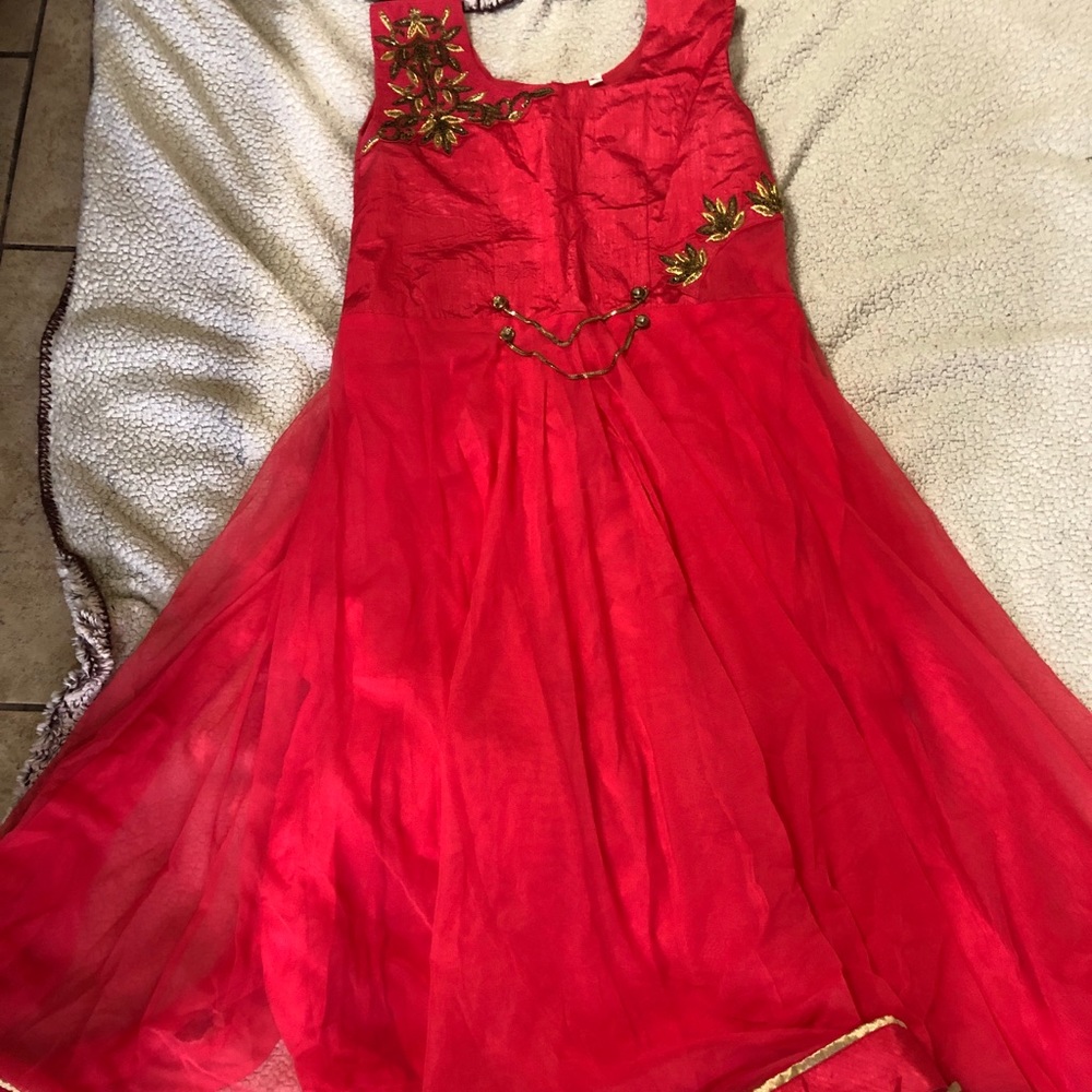 Anarkali net dress. With Dupatta and pent.